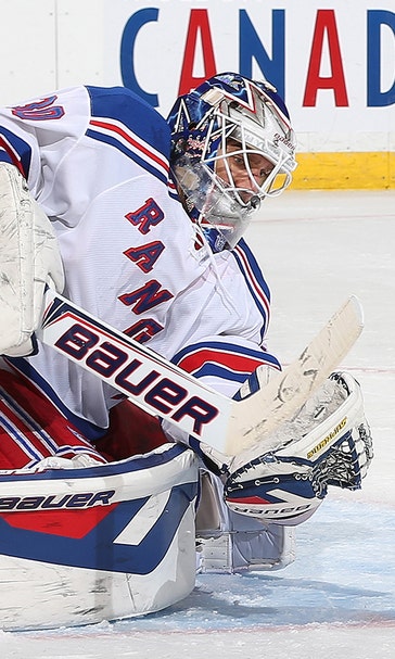 Lundqvist tops Senators to set Rangers career wins mark